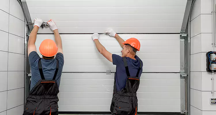 Garage Door Bottom Panel Repair in Wesley Chapel, FL